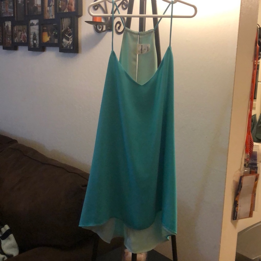 Women’s teal colored top